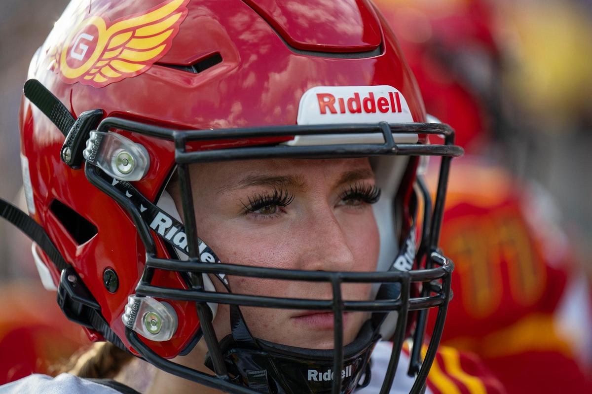 Kansas City Glory defensive back Brooke Tanner watched from the sidelines as the city’s semi-professional women’s full-contact tackle football team took the field for their home opener against Texas Elite at Hicks Field on Saturday, March 29, 2025, at the Pembroke Hill School in Kansas City.
