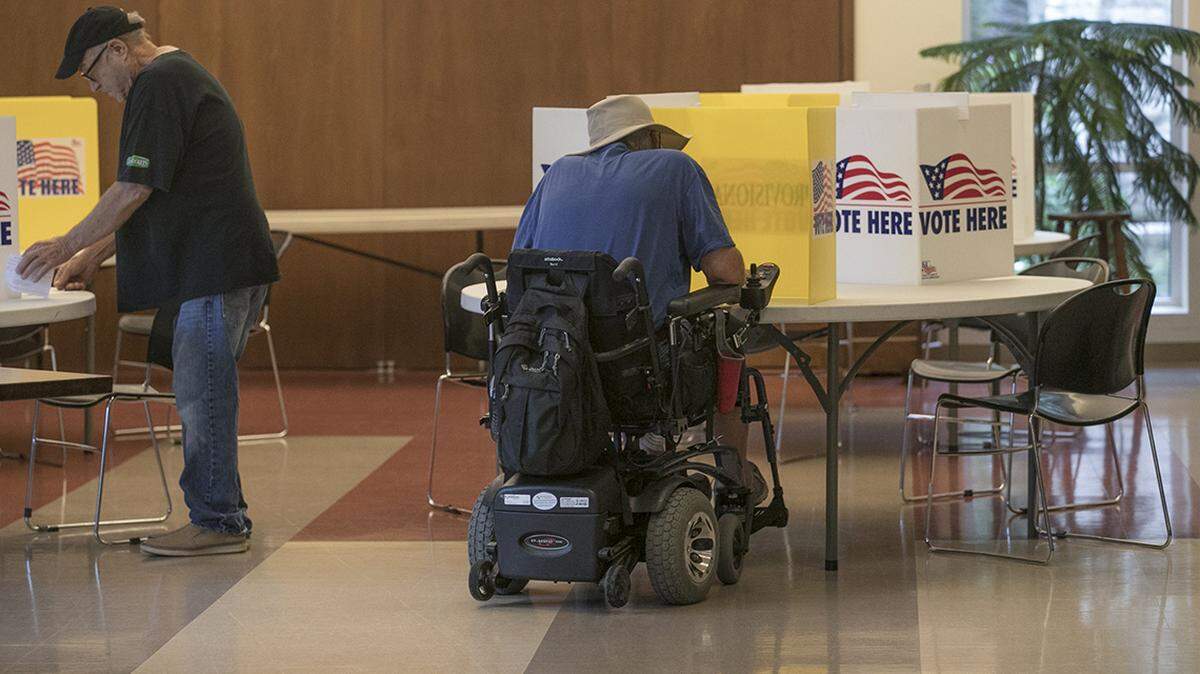 Voters cast their ballots at Kansas City’s Central United Methodist Church in the Aug. 7 election.
