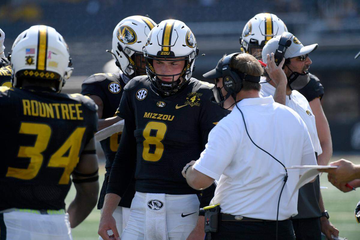 Missouri head coach Eliah Drinkwitz talked with quarterback Connor Bazelak during the Tigers’ win over LSU, in which Bazelak had an impressive breakout performance.