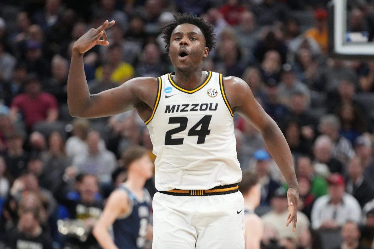 Missouri Tigers guard Kobe Brown (24) reacts after scoring a basket agianst the Utah State Aggies during the second half at Golden 1 Center in Sacramento on March 16, 2023.