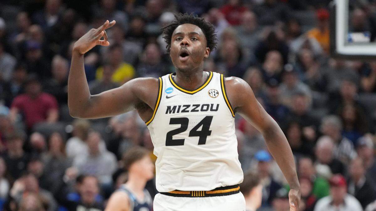 Missouri Tigers guard Kobe Brown (24) reacts after scoring a basket agianst the Utah State Aggies during the second half at Golden 1 Center in Sacramento on March 16, 2023.