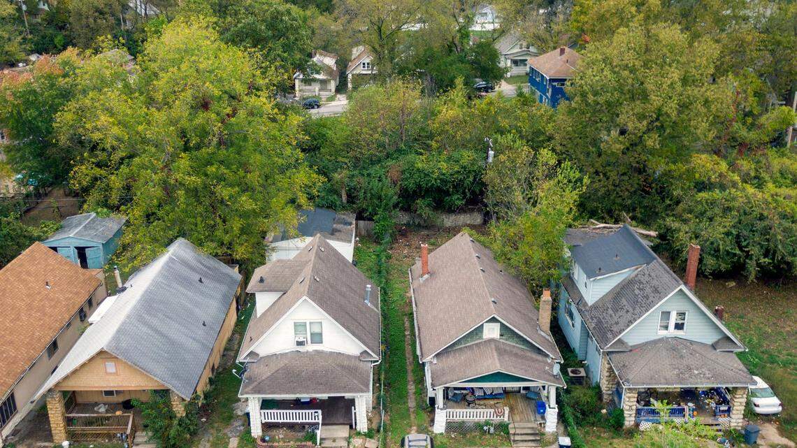 Four houses in the 3800 block of Olive Street on Kansas City’s East Side are seen in 2021.
