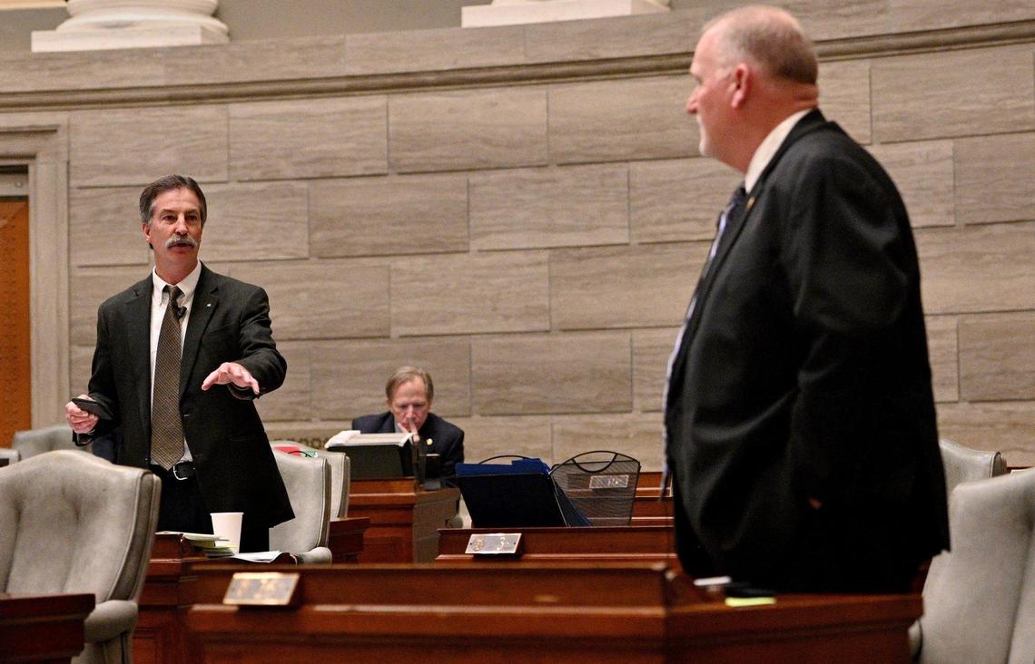 Sen. Mike Moon, R-Ash Grove, left, and Senate President Dave Schatz, hash out a dispute over Moon’s wearing of overalls in the Missouri Senate. The next day, Schatz apologized to Moon, and the chamber mustered up enough goodwill to pass a mid-year budget.