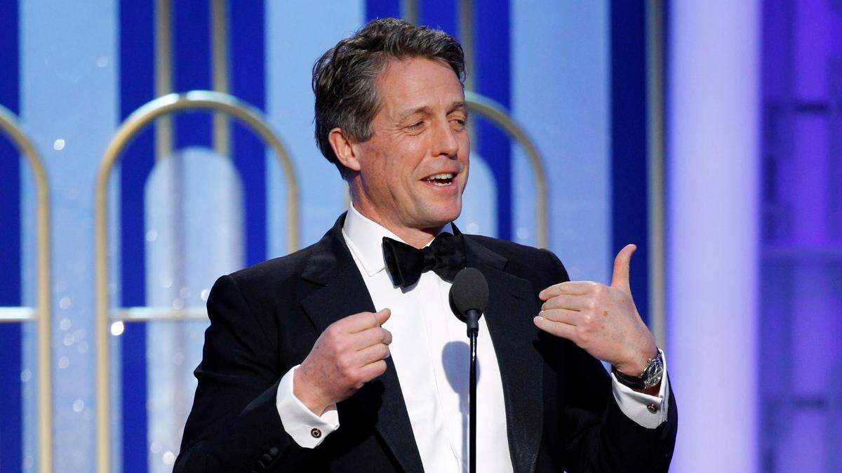 Actor Hugh Grant presents during the 74th Golden Globe Awards at Beverly Hilton.