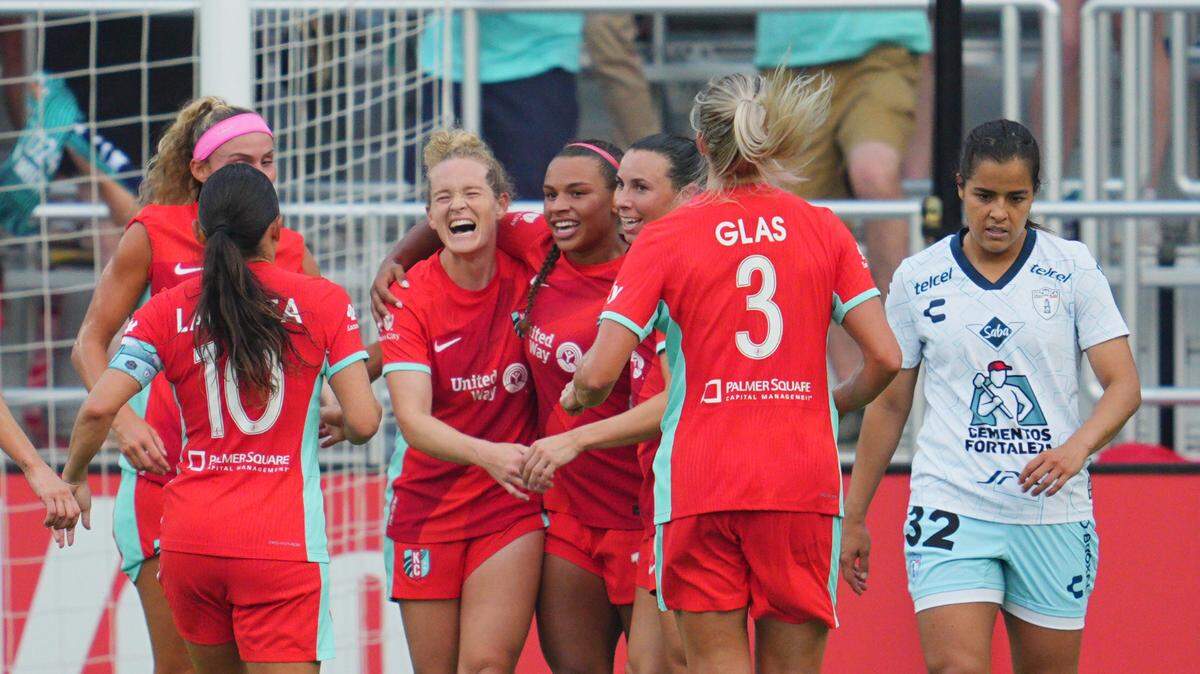 Kansas City Current players celebrate a goal in the first half against Pachuca at CPKC Stadium in Kansas City on July 27, 2024.