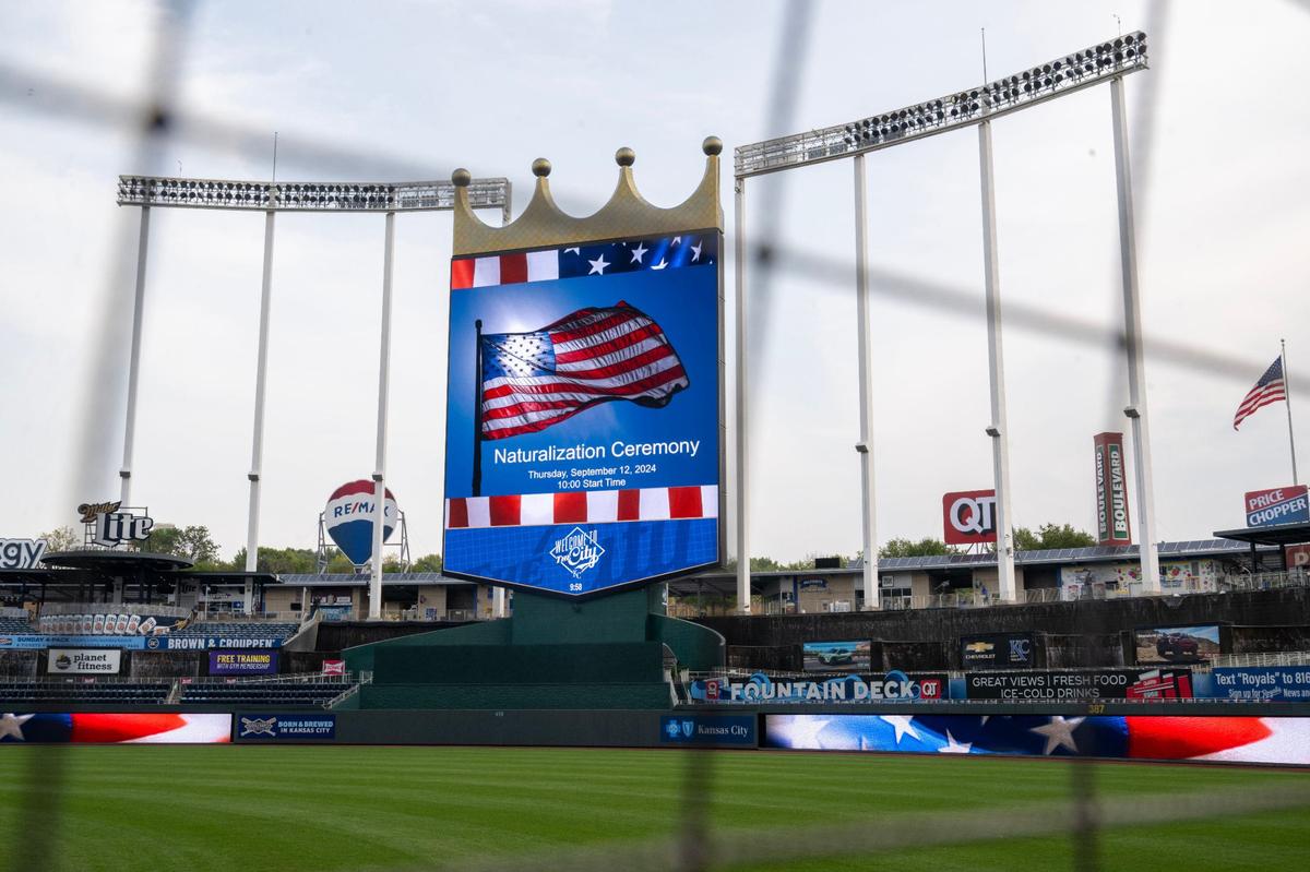 The scoreboard at Kauffman Stadium commemorated the naturalization ceremony in the stands there.