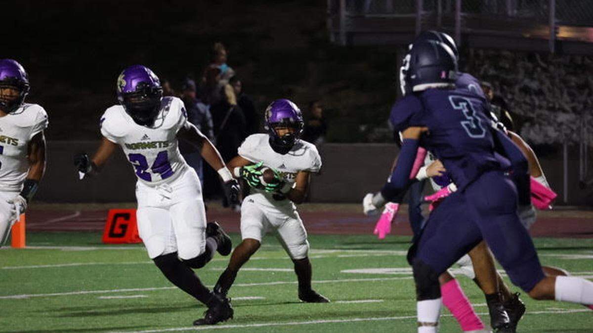 North Kansas City’s Mahki Staten looks for an opening against a stout Oak Park defense during Oak Park’s 13-6 win over North Kansas City on Friday night.