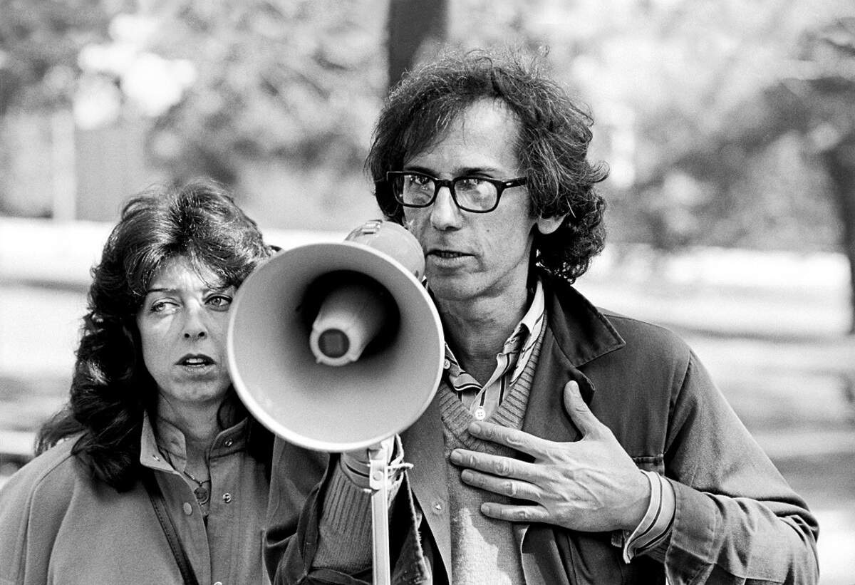 Image of Christo and spouse Jeanne-Claude in October 1978 directing volunteers at Jacob Loose Park.