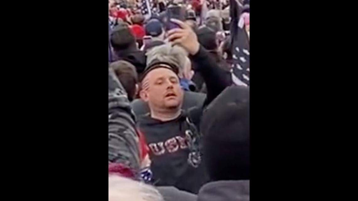 Prosecutors say this is Chad Suenram, in a USMC sweatshirt, during the Capitol riot on Jan. 6, 2021.