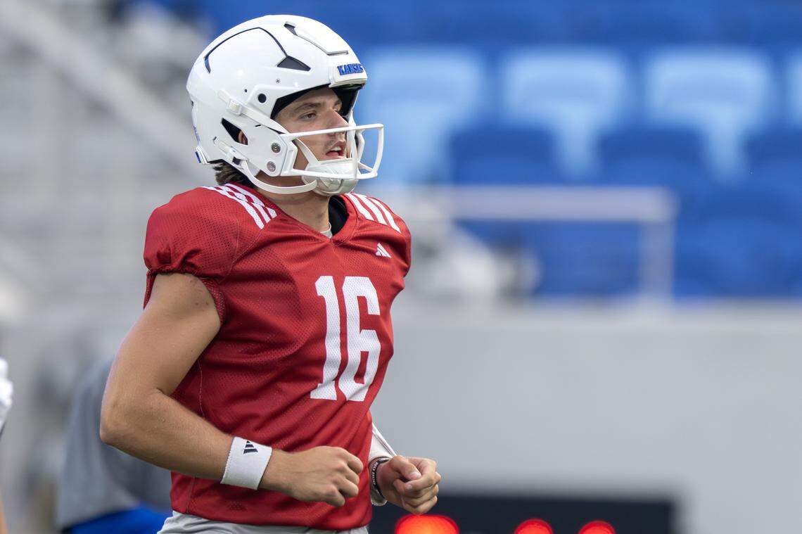 Kansas Jayhawks quarterback David McComb (16) warms up during practice at the newly renovated David Booth Kansas Memorial Stadium on Friday, Aug. 1, 2025, in Lawrence, Kansas.