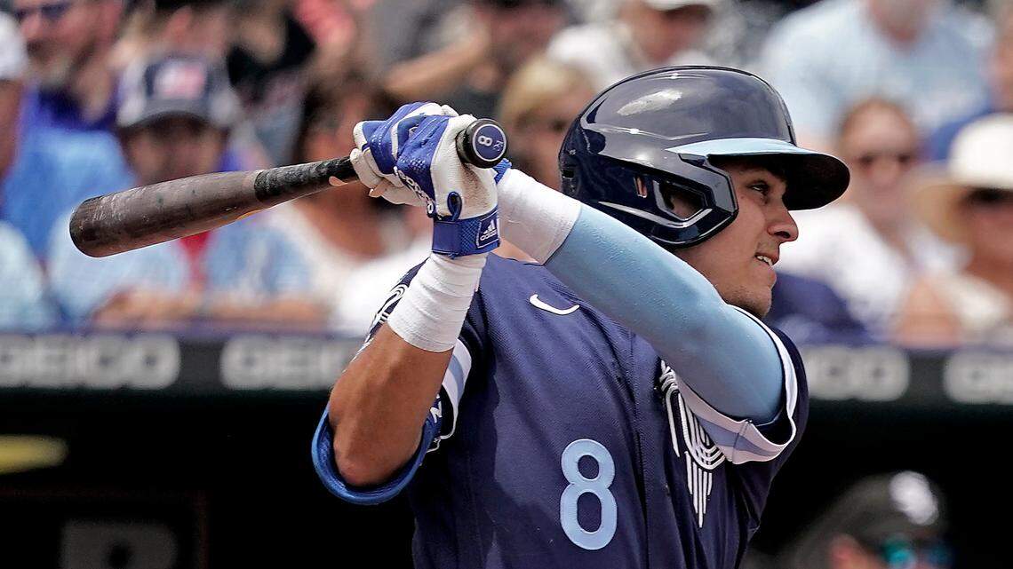 Kansas City Royals’ Nicky Lopez hits an RBI double during the second inning of a baseball game against the Chicago White Sox Thursday, May 19, 2022, in Kansas City, Mo. (AP Photo/Charlie Riedel)