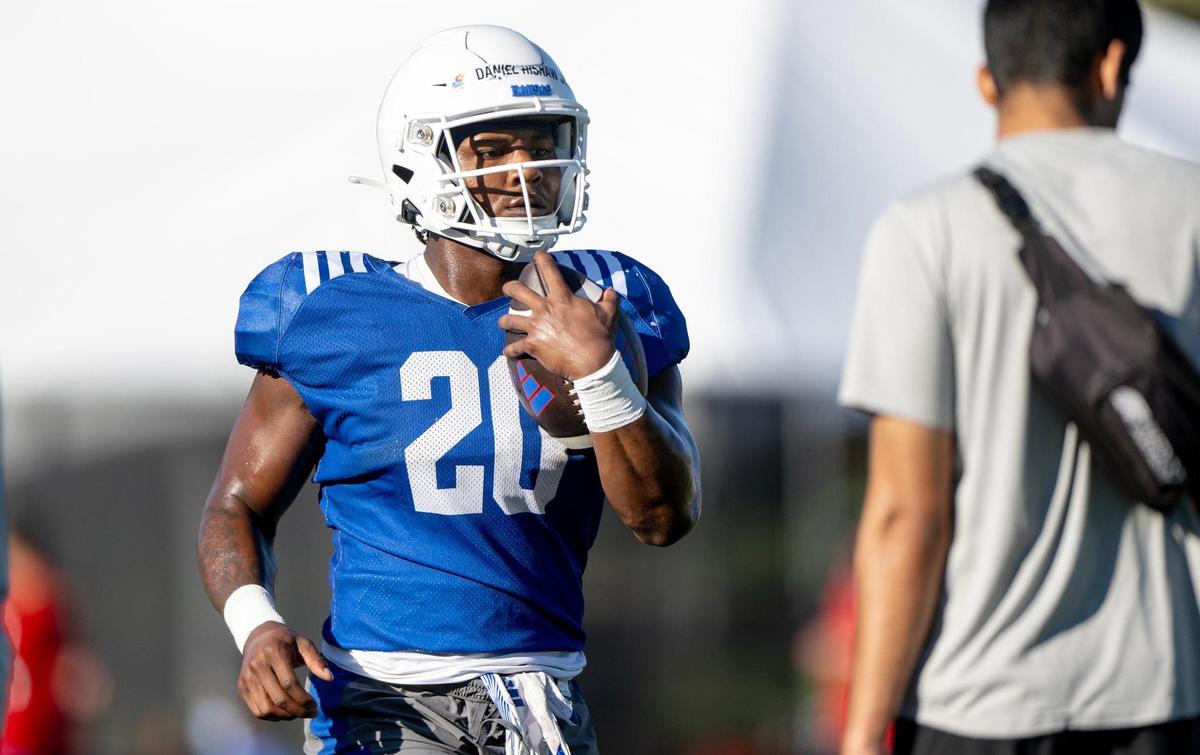 Kansas running back Daniel Hishaw Jr. runs with the ball during a KU football practice on Wednesday, Aug. 16, 2023, in Lawrence, Kan.