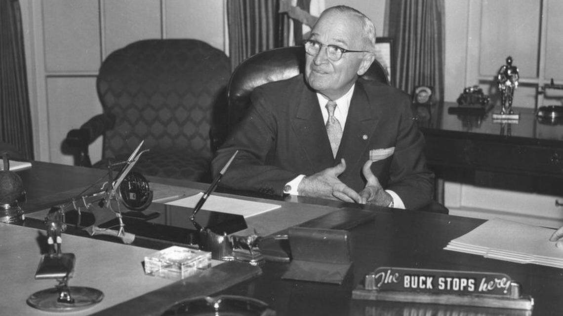In July 1959, former President Harry S. Truman sat at the desk in a reproduction of his White House office at the Harry S. Truman Library and Museum in Independence, complete with “The Buck Stops Here” sign.
