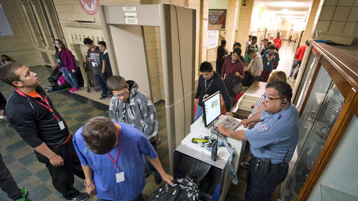 Students entering Wyandotte High School in Kansas City, Kansas, must pass through metal detectors.