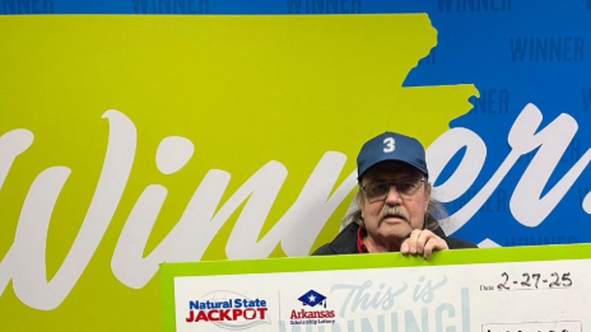 A lottery player woke up and checked his numbers, thinking he won $7. He later realized his Arkansas prize was much more.
