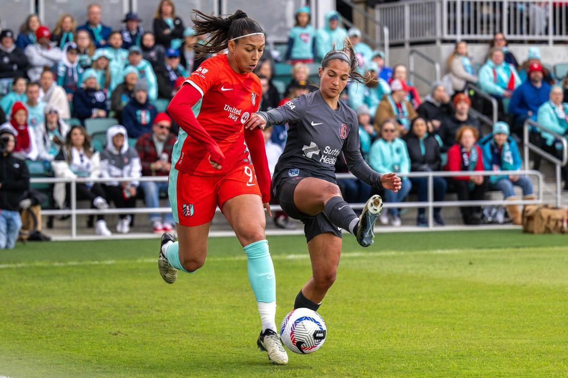 Kansas City Current forward Bia Zaneratto (9) shields the ball from Bay FC midfielder Deyna Castellanos (10) in the first half of an NWSL game on Saturday, April 20, 2024, in Kansas City.