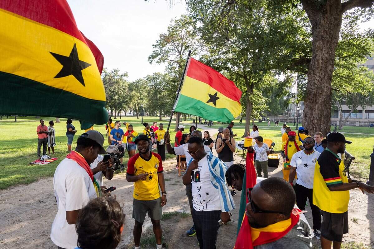 Ghanian fans hold a ‘jama,’ Ghanian for cheer or rally, on Thursday, July 2, 2026, the day before the Ghana soccer team faces Colombia in a Round of 32 match in Kansas City.