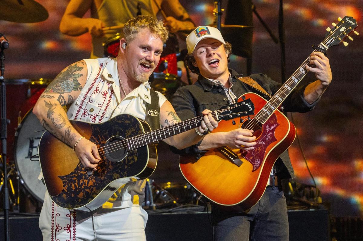 Ernest, left, performs at T-Mobile Center on Wednesday, Nov. 13, 2024, in Kansas City.