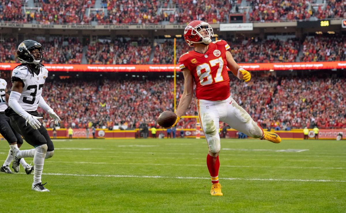 Kansas City Chiefs tight end Travis Kelce (87) celebrates a touchdown against the Jacksonville Jaguars during an NFL divisional round playoff game at GEHA Field at Arrowhead Stadium on Saturday, Jan. 21, 2023, in Kansas City.