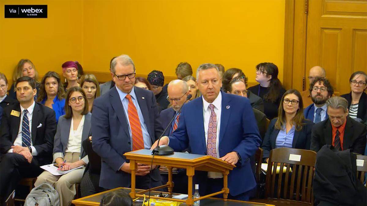 KU Chancellor Douglas A. Girod and K-State President Richard H. Linton stand together in opposition to the bill at the Kansas House Judiciary Committee on Tuesday Feb. 11.