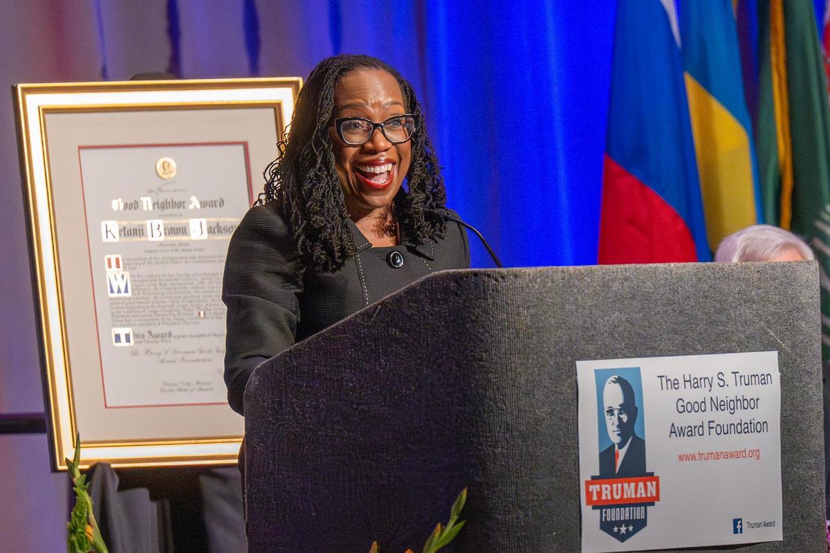 U.S. Supreme Court Justice Ketanji Brown Jackson smiles as she delivers a speech after receiving the Harry S. Truman Good Neighbor Award.