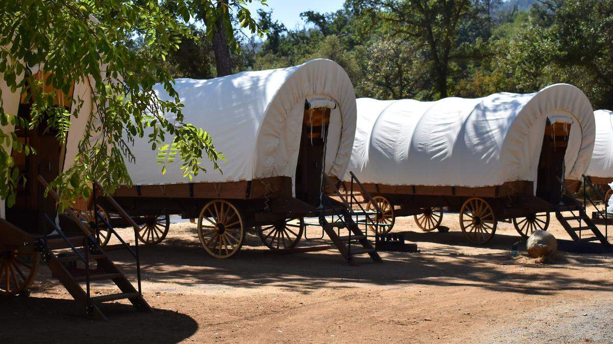 Yosemite Pines Resort in Groveland, California, 22 miles from the western gate of Yosemite National Park, has six Conestoga Wagons that people can glamp in. The wagons are air-conditioned and roomier than the ones pioneers traveled in.