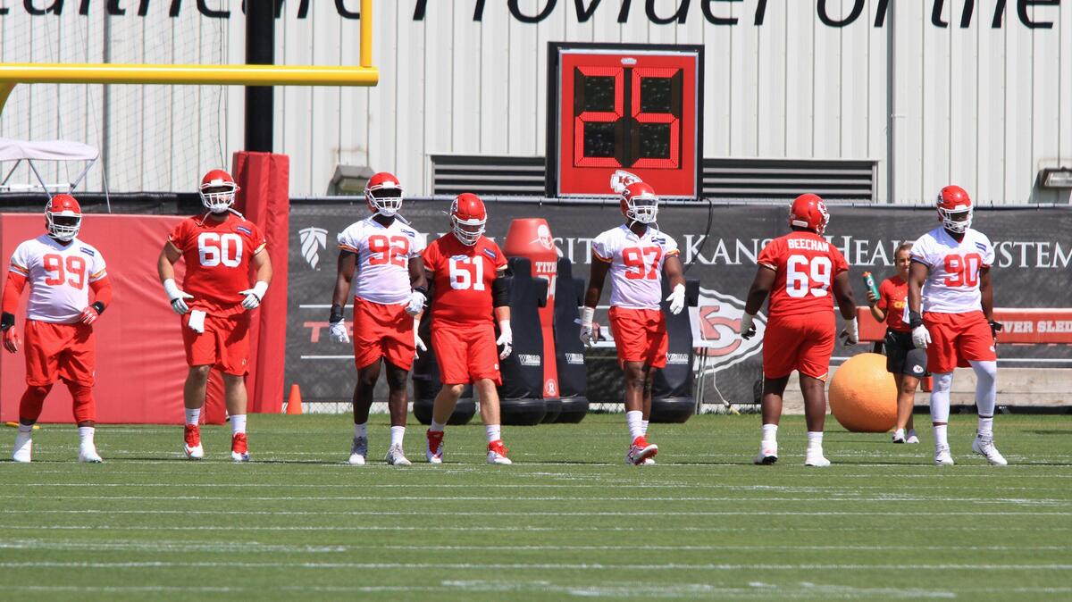 Members of the Kansas City Chiefs warm up for minicamp on June 11, 2019, including newly acquired players Khalen Saunders, 99, Alex Okafor, 97 and Emmanuel Ogbah, 90.