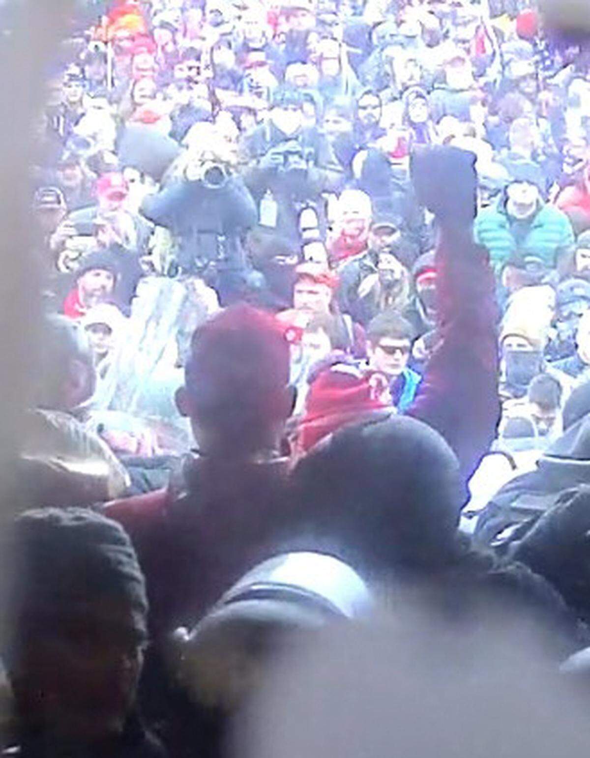 Prosecutors say Daniel Donnelly Jr., of St. Louis, raised his fist and arm in the air, appearing to encourage the mob after police forced rioters out of the tunnel entrance to the Capitol on Jan 6, 2021.