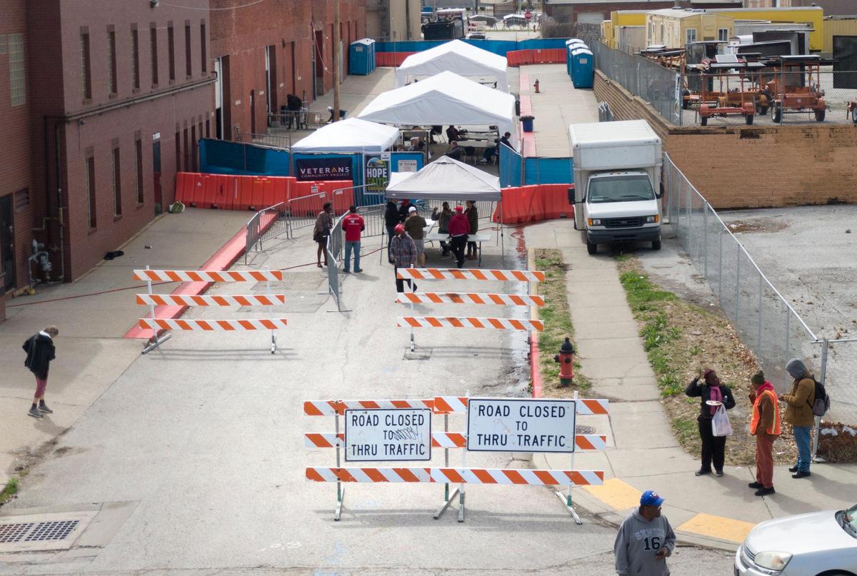 Kansas City nonprofits have blocked off a portion of Virginia Avenue to serve three meals a day, take temperatures and offer other services to the homeless during the coronavirus outbreak.