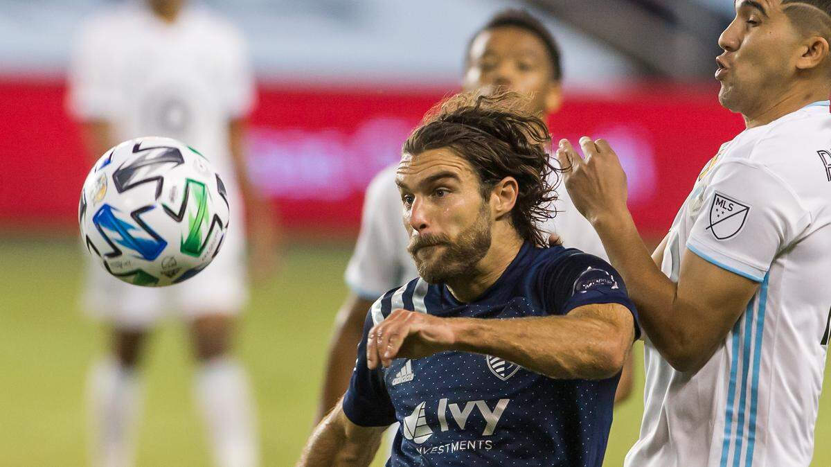Sporting Kansas City turned down a club option on midfielder Graham Zusi , left, making the longtime KC veteran a free agent. But the club says it’s continuing to negotiate a deal to keep him in KC.