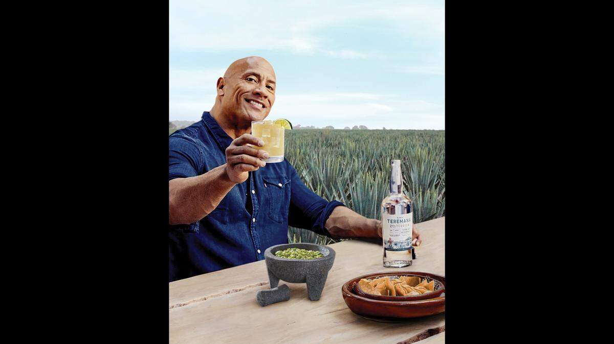 Dwayne “The Rock” Johnson is picking up the tab for an order of guacamole — if you try his tequila.