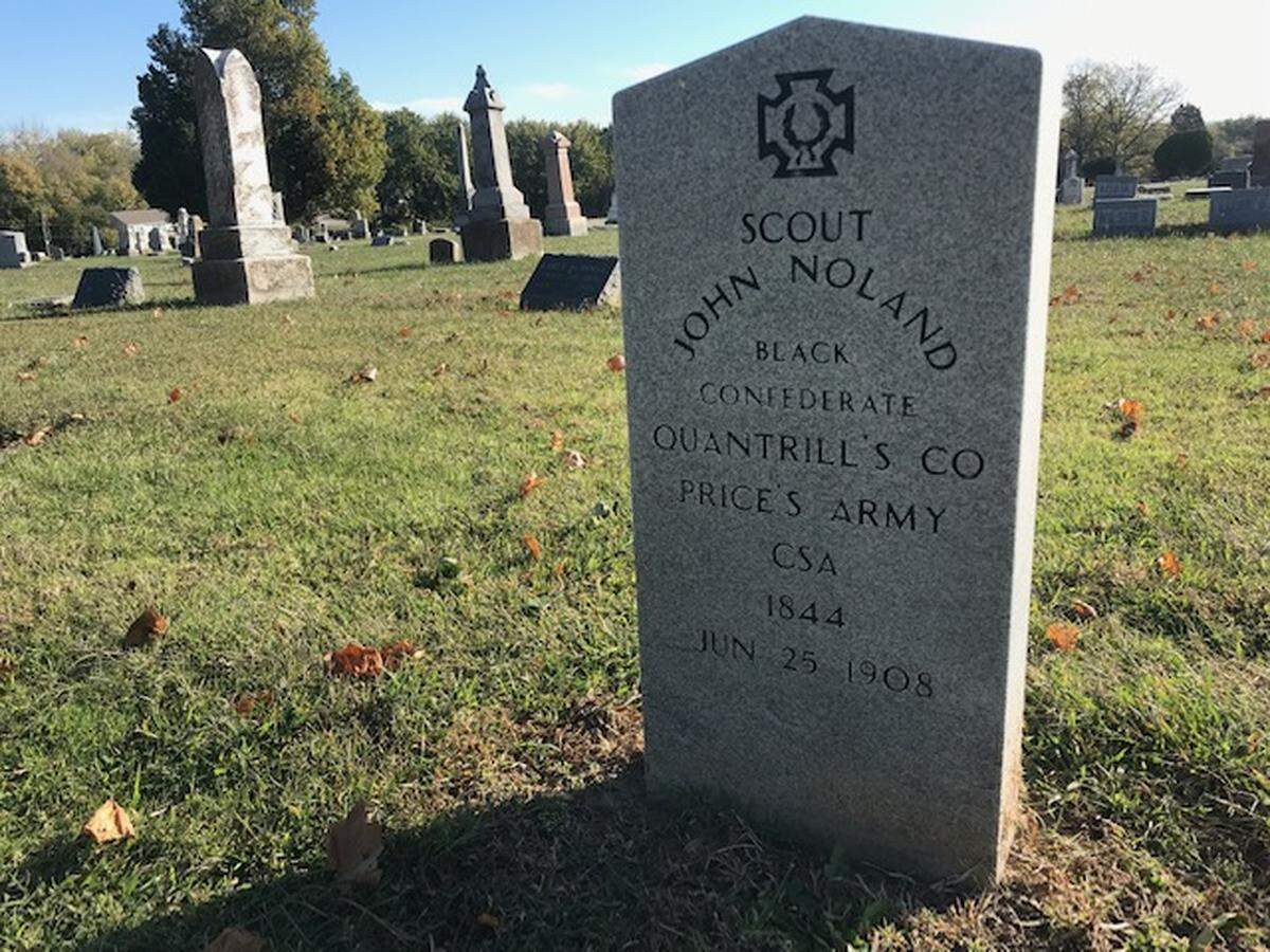 The grave of John Noland, a Black Confederate soldier, interred at historic Woodlawn Cemetery in Independence.