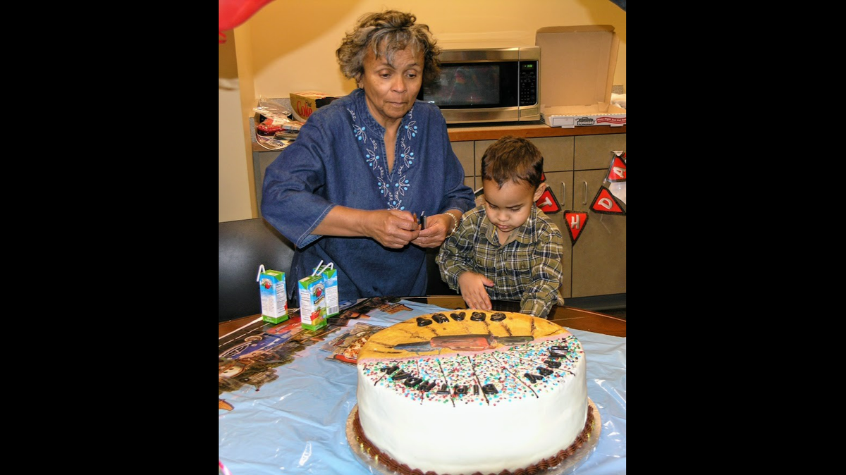 Sonja Holbert puts the finishing touches on a cake. Family say she had a knack for decorating cakes and would make them for her relatives.