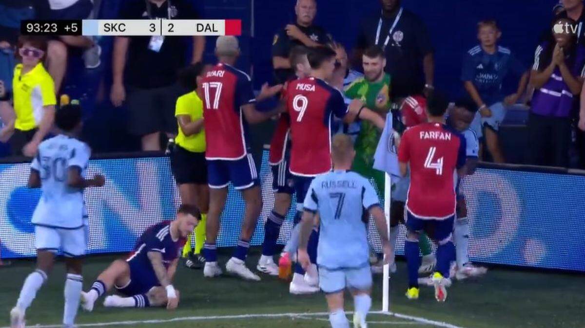 Cards were shown after a contentious throw-in late in Sporting Kansas City’s win over FC Dallas.