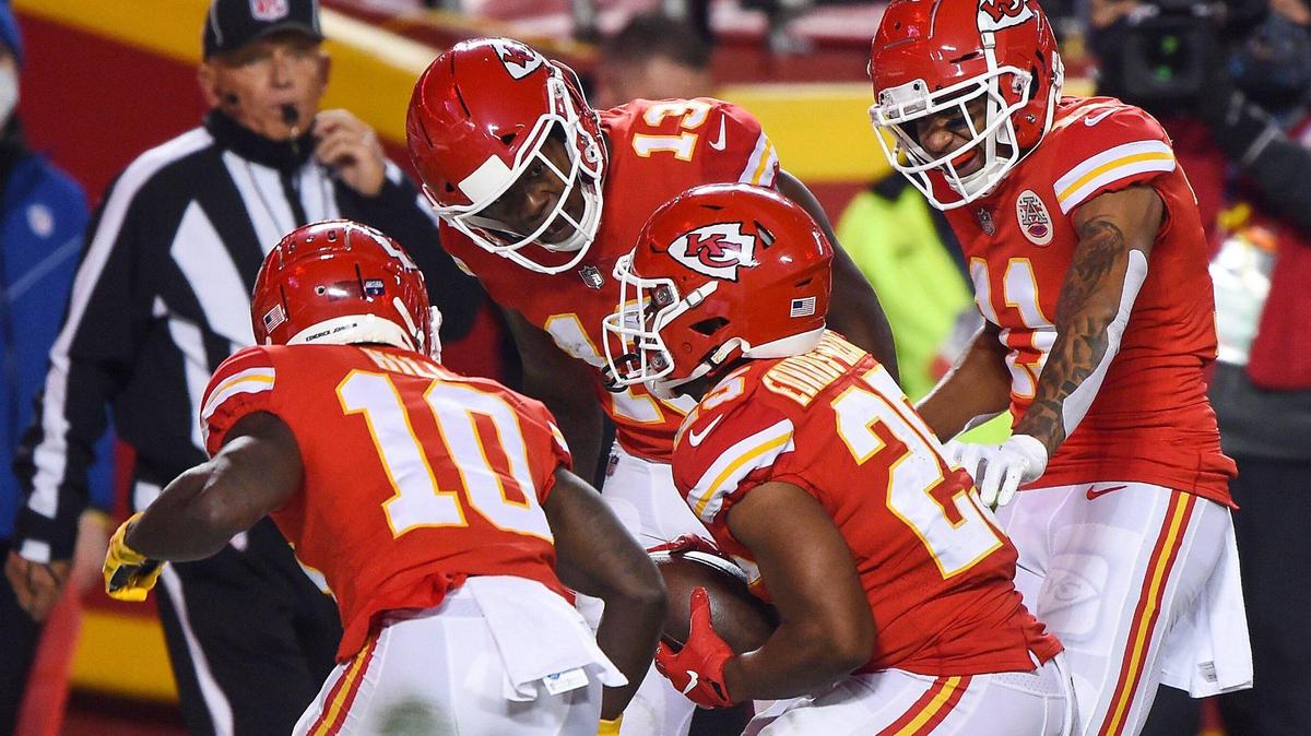 Kansas City Chiefs running back Clyde Edwards-Helaire, No. 25, celebrates with teammates Tyreek Hill, Byron Pringle and Demarcus Robinson after running in a touchdown in the second quarter Sunday, January 24, 2021, during the AFC Championship Game at Arrowhead Stadium.