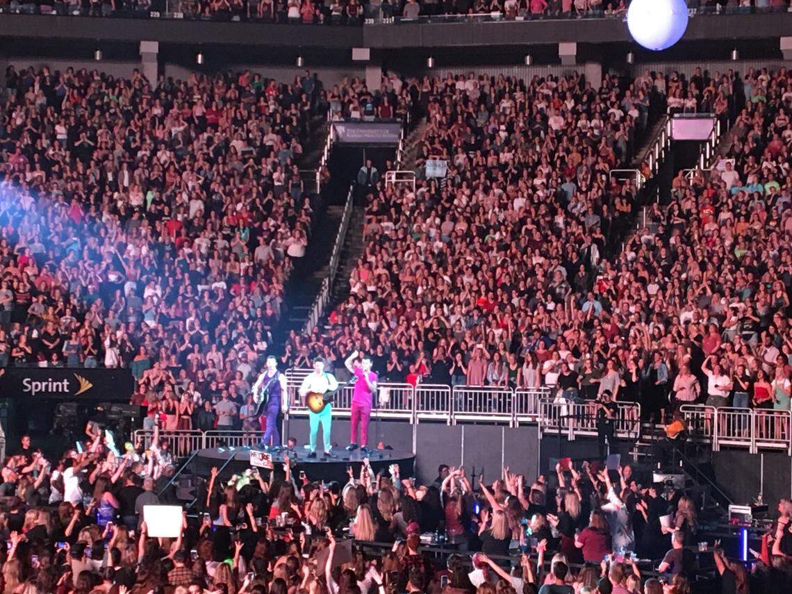 The Jonas Brothers’ ”Happiness Begins” tour features a secondary stage, pyrotechnics, confetti blasts and videos.