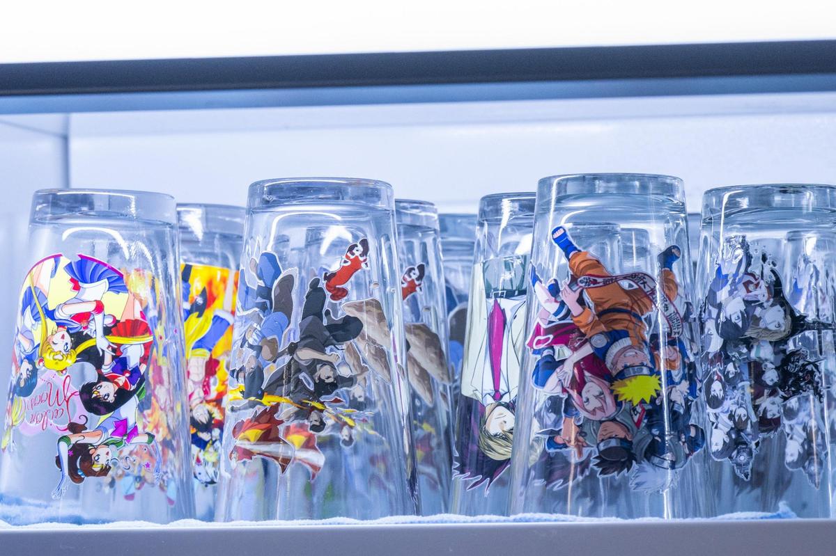 Some drinks at Otaku are served in glasses featuring anime characters.