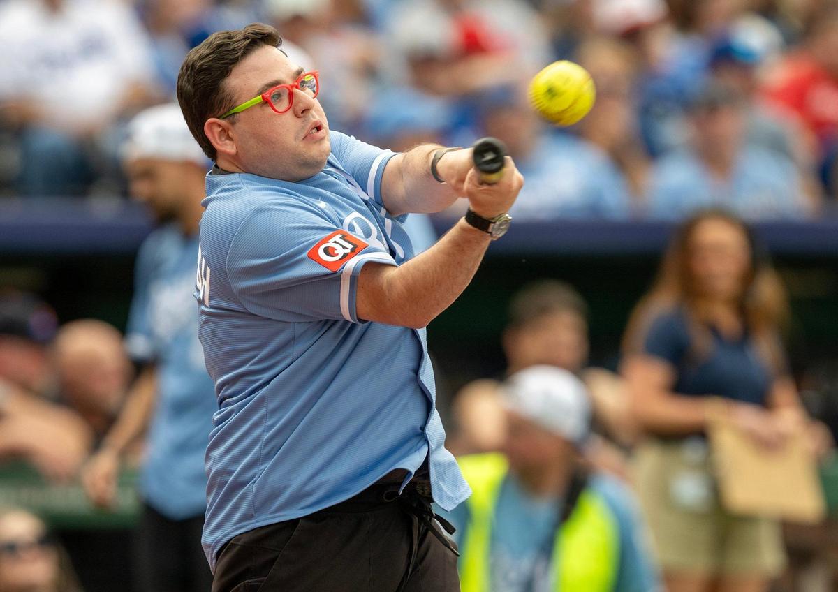 Adeev Potash, jazz musicians and TV personality, hits during the the Big Slick Celebrity Softball game on Friday, May 30, 2025, at Kauffman Stadium in Kansas City.
