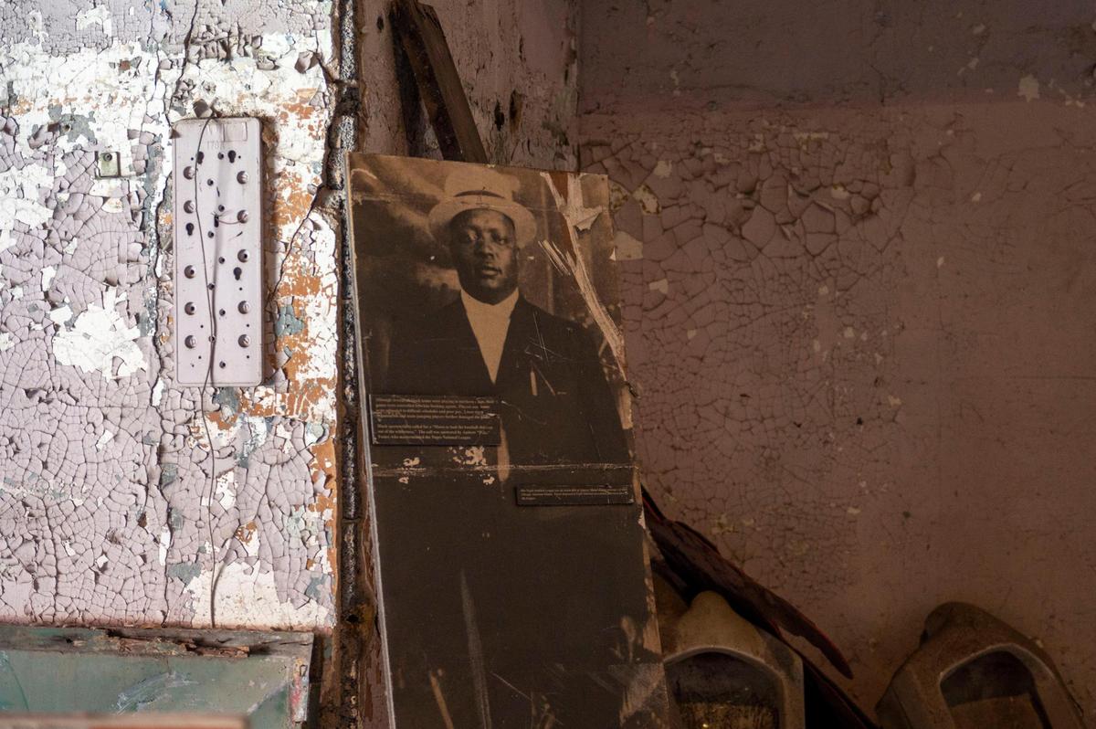 An old poster from the nearby Negro Leagues Baseball Museum is stored at Boone Theater, which is being redeveloped by the Vine Street Collaborative.