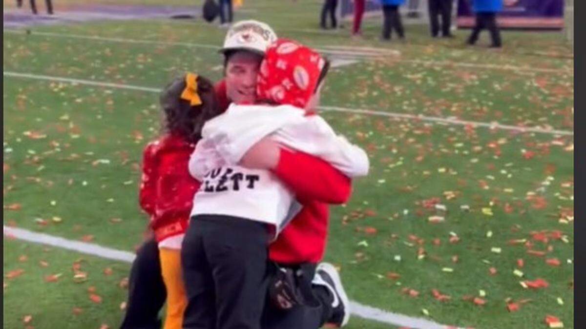Chiefs assistant running backs coach Porter Ellett celebrated with two of his kids after Super Bowl LVIII.