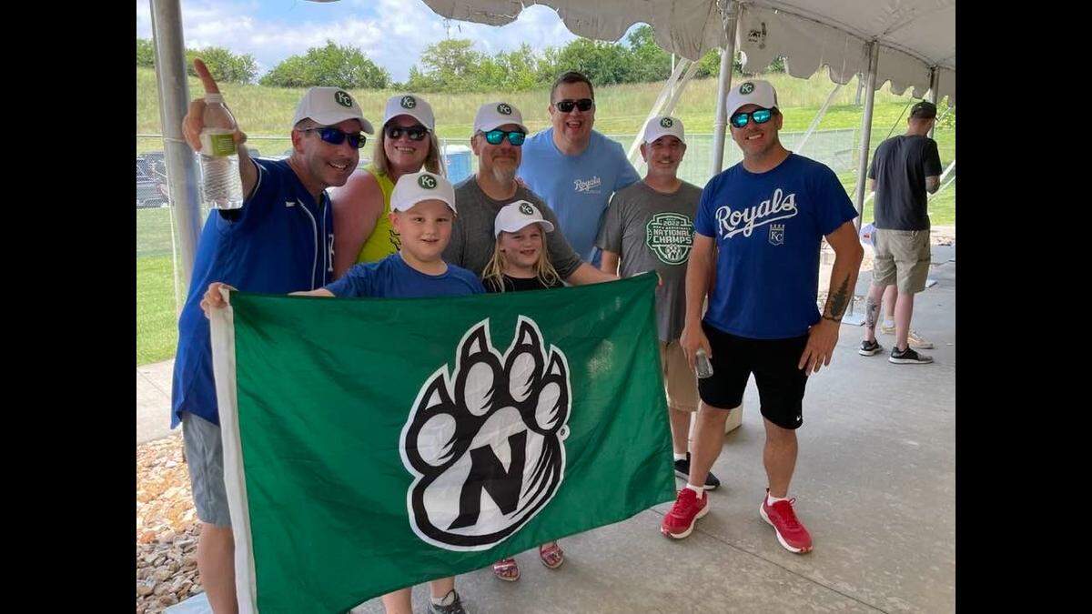 Dennis Sharkey Jr., 50, is pictured with loved ones in this submitted photo. Sharkey is remembered as an avid fan of sports teams at his alma mater, Northwest Missouri State University.