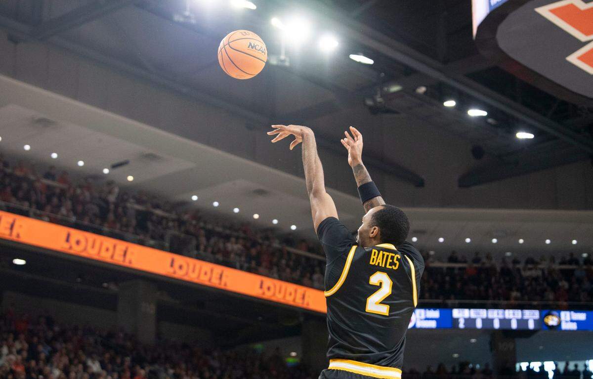 Missouri Tigers guard and KC native Tamar Bates takes a jump shot during a Saturday, Jan 4, 2025 men’s basketball game against the Auburn Tigers at Neville Arena in Auburn, Alabama.