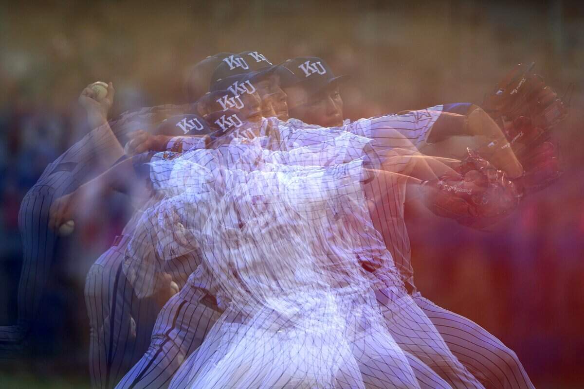 A multiple-exposure photograph shows Kansas pitcher Kannon Carr (18) during his pitching motion in the ninth inning of an NCAA Tournament baseball game against Oklahoma at Hoglund Ballpark on Saturday, June 6, 2026, in Lawrence