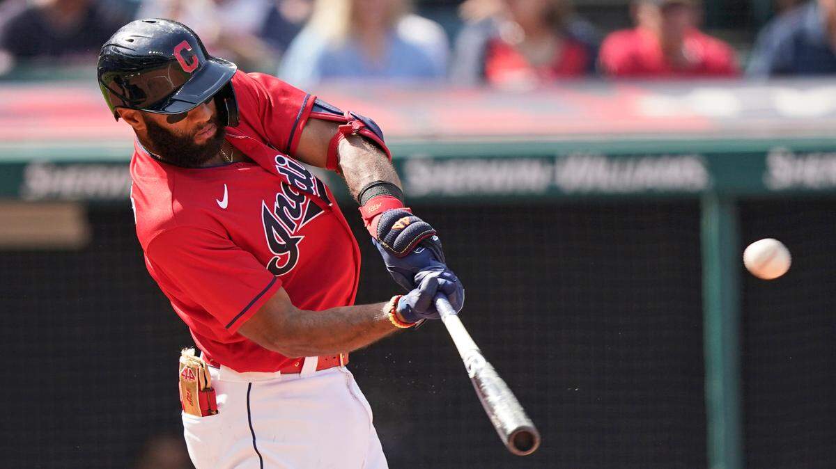 Cleveland Indians’ Amed Rosario hits a solo home run in the third inning of a baseball game against the Kansas City Royals, Monday, Sept. 27, 2021, in Cleveland. (AP Photo/Tony Dejak)