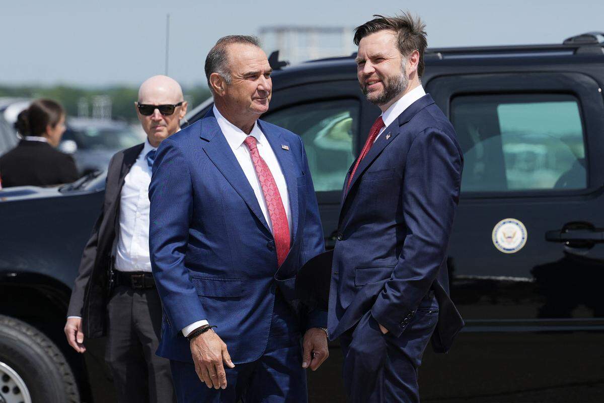 Missouri Governor Mike Kehoe (L) welcomes US Vice President JD Vance as he arrives at Kansas City International Airport in Kansas City, Missouri, on May 18, 2026. (Photo by Eric Lee / POOL / AFP via Getty Images)