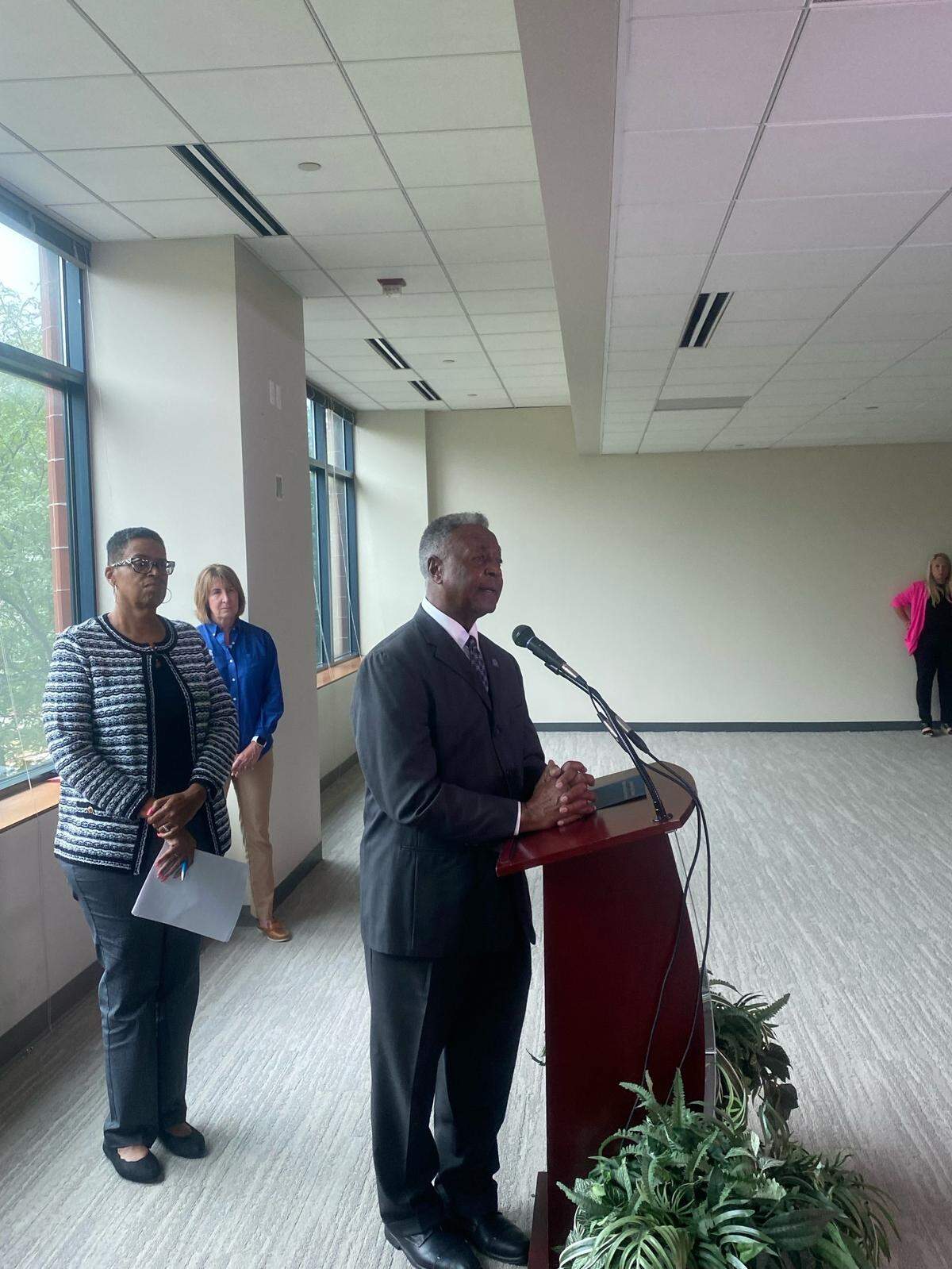 Jackson County Executive Frank White Jr. speaks at a press conference on Monday following the Missouri State Tax Commission’s order for the county to rollback property assessments. Assessment director Gail McCann Beatty and deputy county assessor Maureen Monaghan stand behind him.