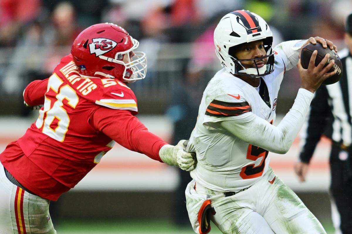 Kansas City Chiefs defensive end George Karlaftis, left, sacked Cleveland Browns quarterback Jameis Winston twice during an NFL Week 15 game at Huntington Bank Field in Cleveland, Ohio on Sunday, Dec. 15, 2024.