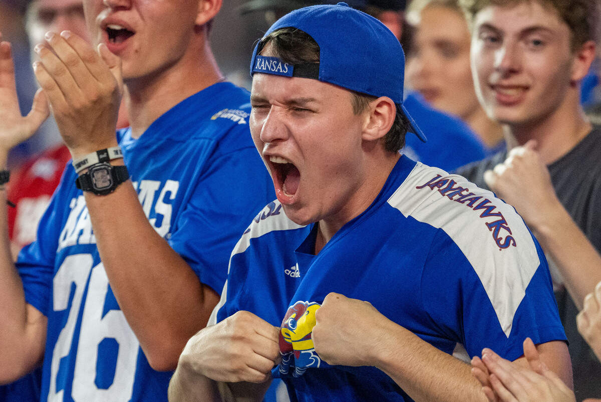 A Kansas Jayhawks fan screams in celebration in the second half of the Jayhawks game vs. Long Island University Sharks at David Booth Memorial Stadium on Friday, September 4, 2026, in Lawrence.