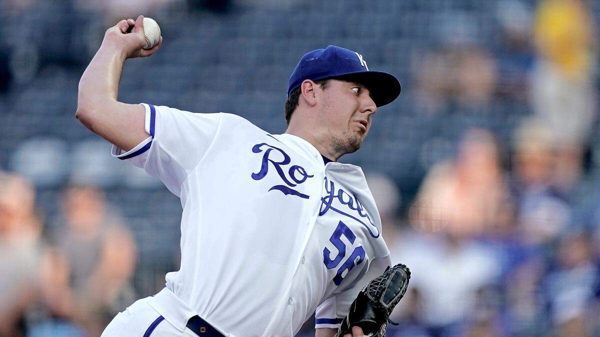 Kansas City Royals starting pitcher Scott Barlow throws during the first inning of a baseball game against the Toronto Blue Jays Tuesday, June 7, 2022, in Kansas City, Mo. (AP Photo/Charlie Riedel)