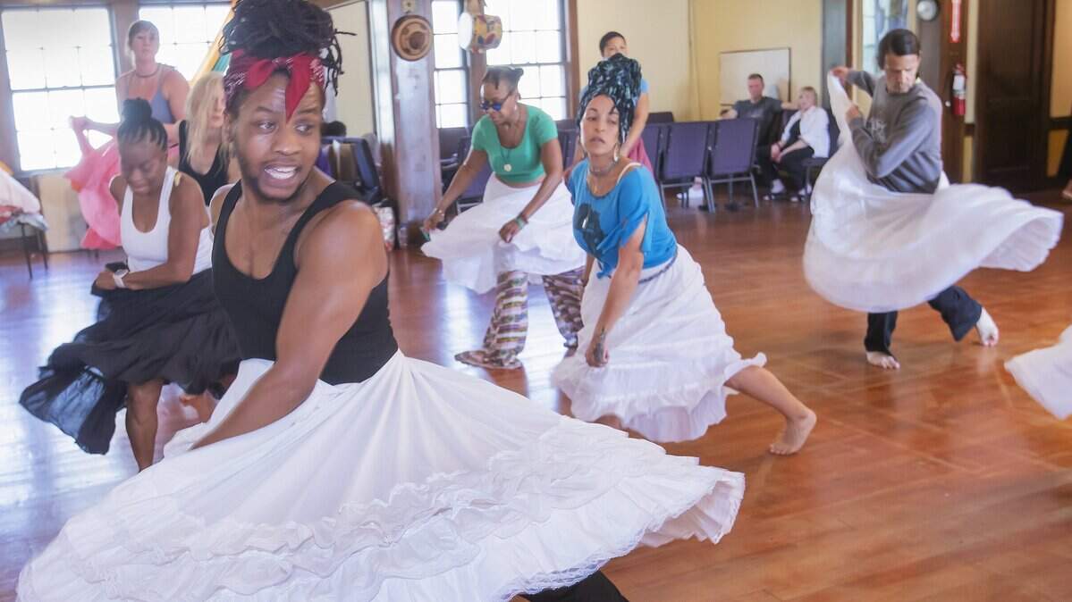 Selah Thompson (front) taught the Afro Cuban dance "Yemaya" during a Traditional Music Society dance class, Saturday, October 4, 2025 at St. Mark's Hope and Peace Lutheran Church in Kansas City.